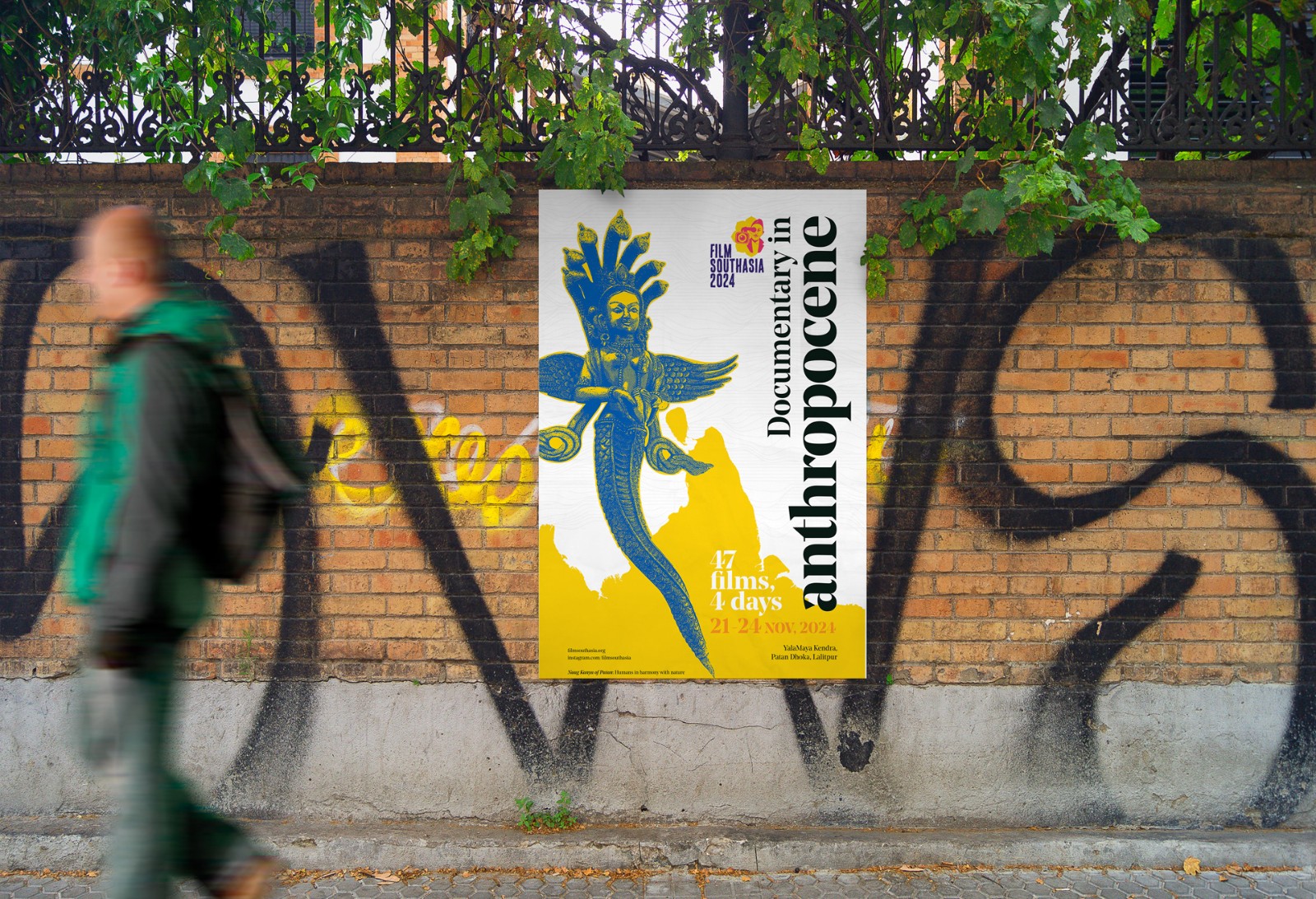 Film Southasia 2024 poster pasted on a street wall